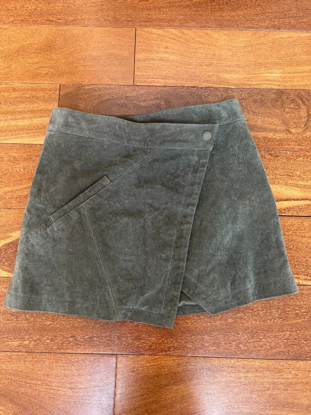Blank NYC moss green mini suede asymmetrical wrap front skirt